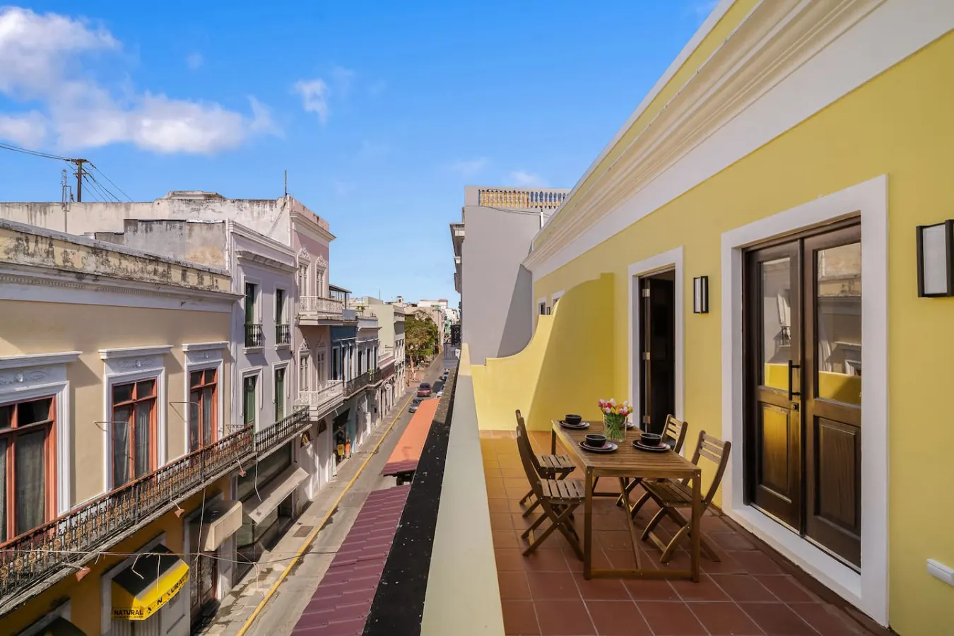 Balcony overlooking a city street — Soho Garden Grand patio, Old San Juan