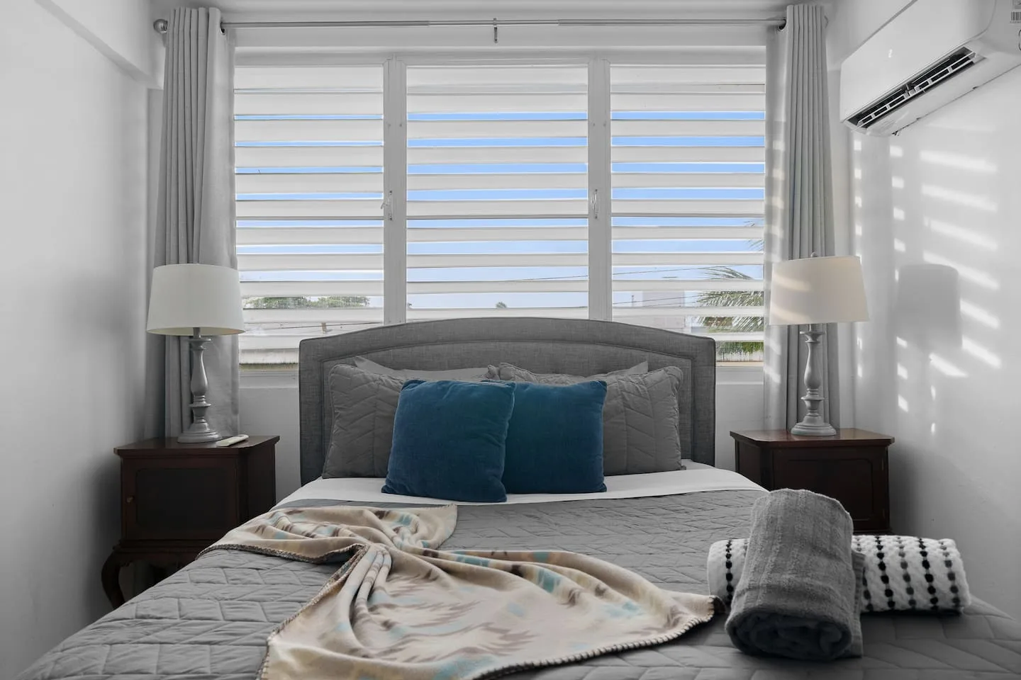 Bedroom with a large bed — Maré 2BR | Near Ocean Park Beach + Laundry, Santurce