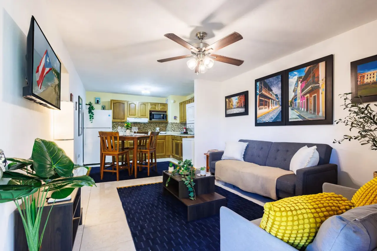 Living room open to the dining area and kitchen — Ocean Sol Historic Old San Juan