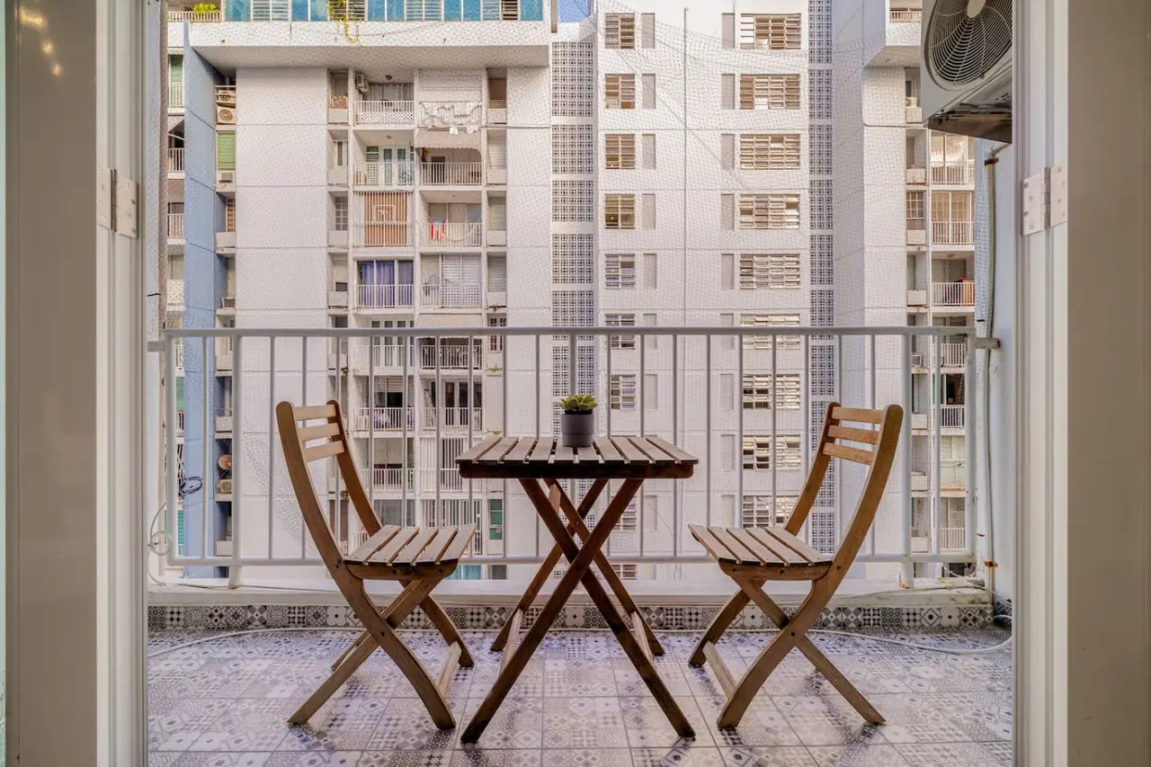 Balcony with a folding bistro set — OceanSide - Pool Balcony, Isla Verde