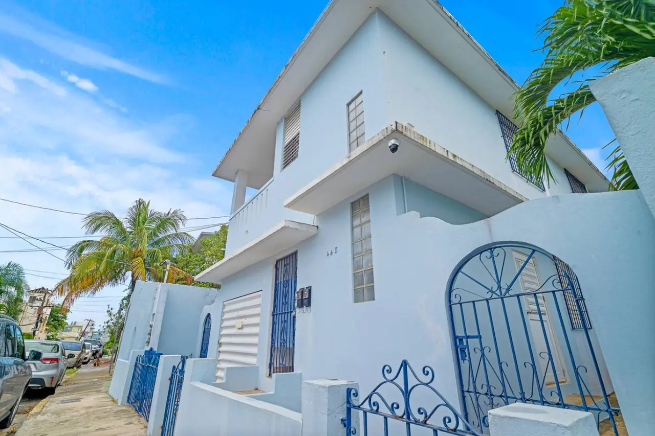 Blue house with a balcony — Sunkiss in Puerto Rico San Juan 3 Bedroom, Santurce