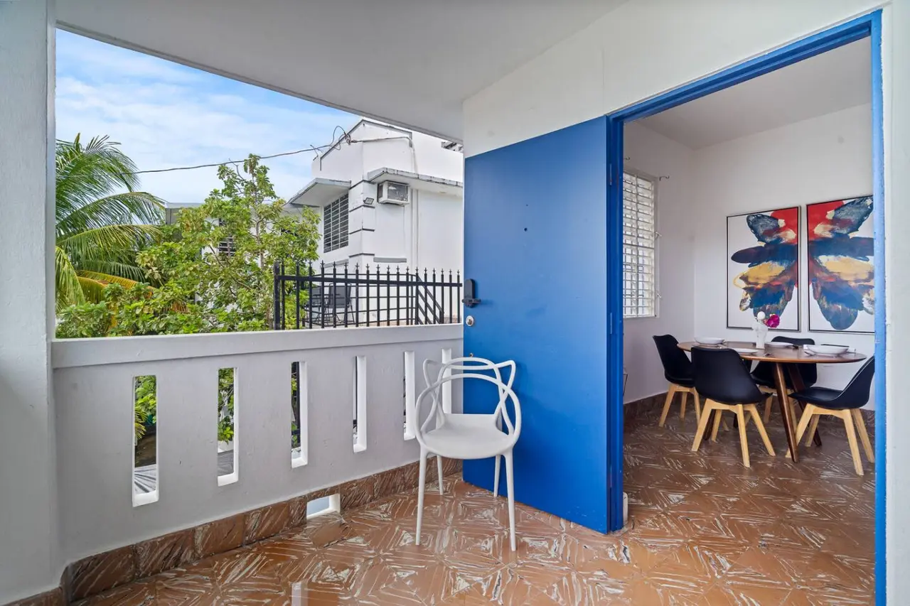 White chair on a balcony — Sunkiss in Puerto Rico San Juan 3 Bedroom, Santurce