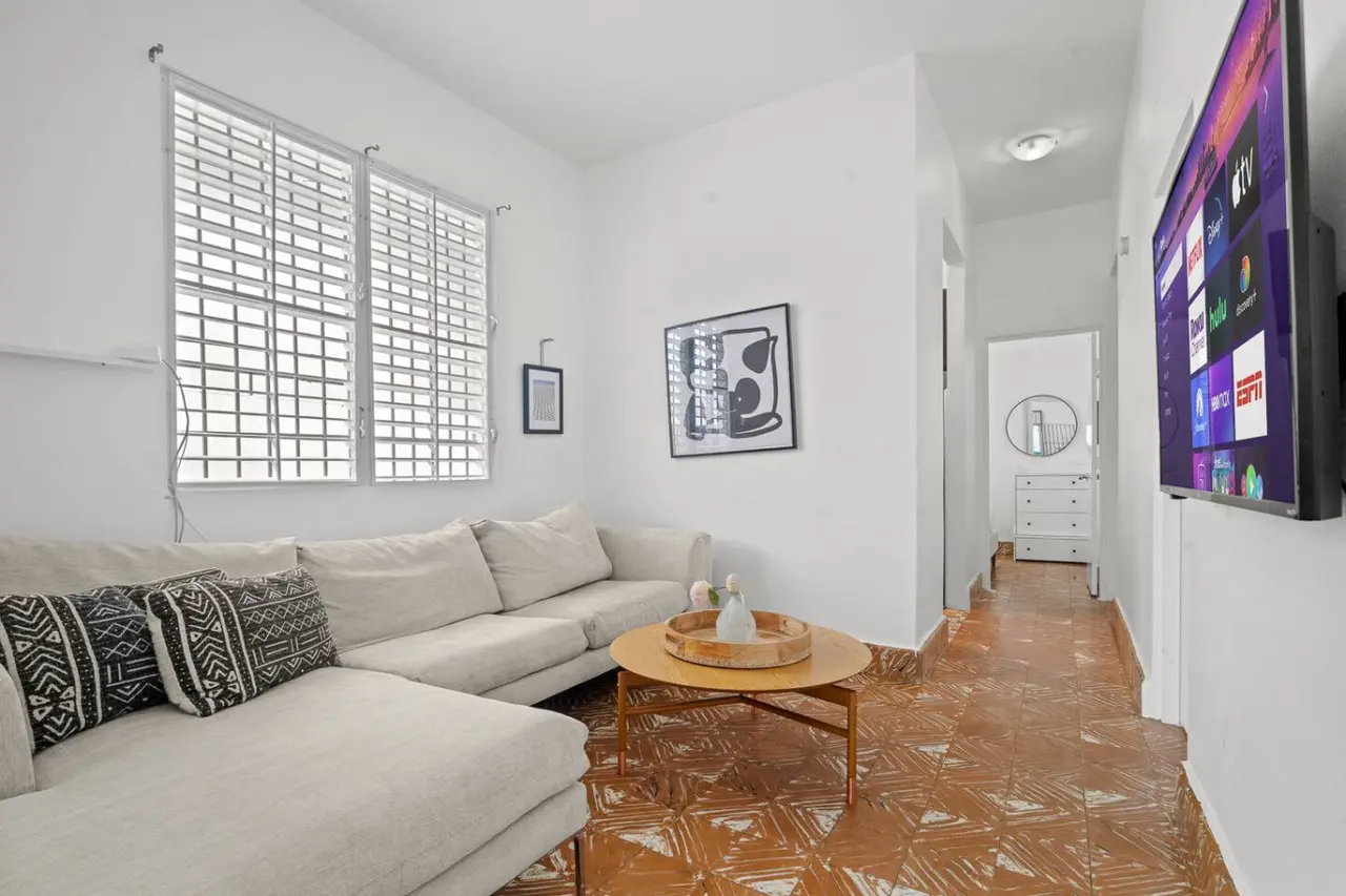Living room with a couch and a table — Sunkiss in Puerto Rico San Juan 3 Bedroom, Santurce