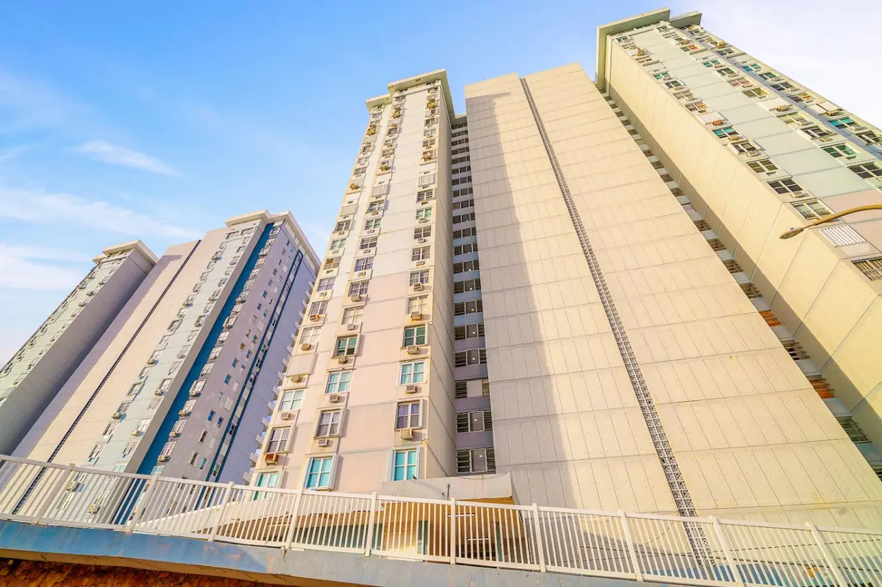 Exterior of the high-rise building, seen from below — Captain’s Beachfront Luquillo Beach House