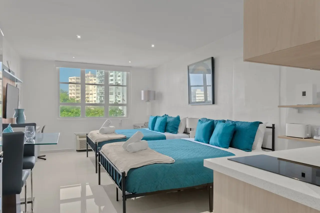 Two beds in a bedroom — T-Mobile District San Juan Next to Beach