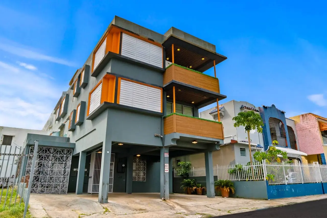 Large building with a lot of windows and a balcony — Santurce Blue 2BR | Near Beach & La Placita